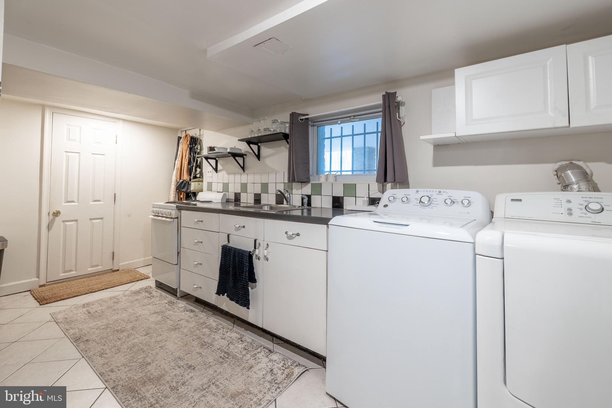 422 17th Street Southeast Washington, DC 20003 - Photo 38 of 59 Kitchen and Full Sized Washer/Dryer on Lower Level