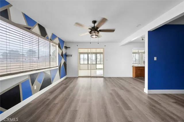 an empty room with windows