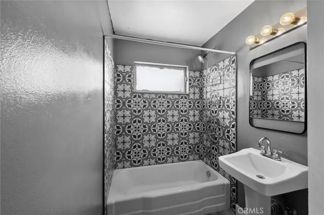 a view of a living room a window and a fireplace