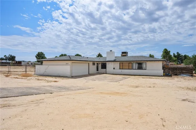 a view of ocean with large trees