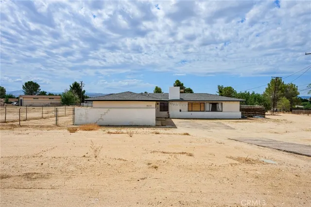 a view of a yard with an trees