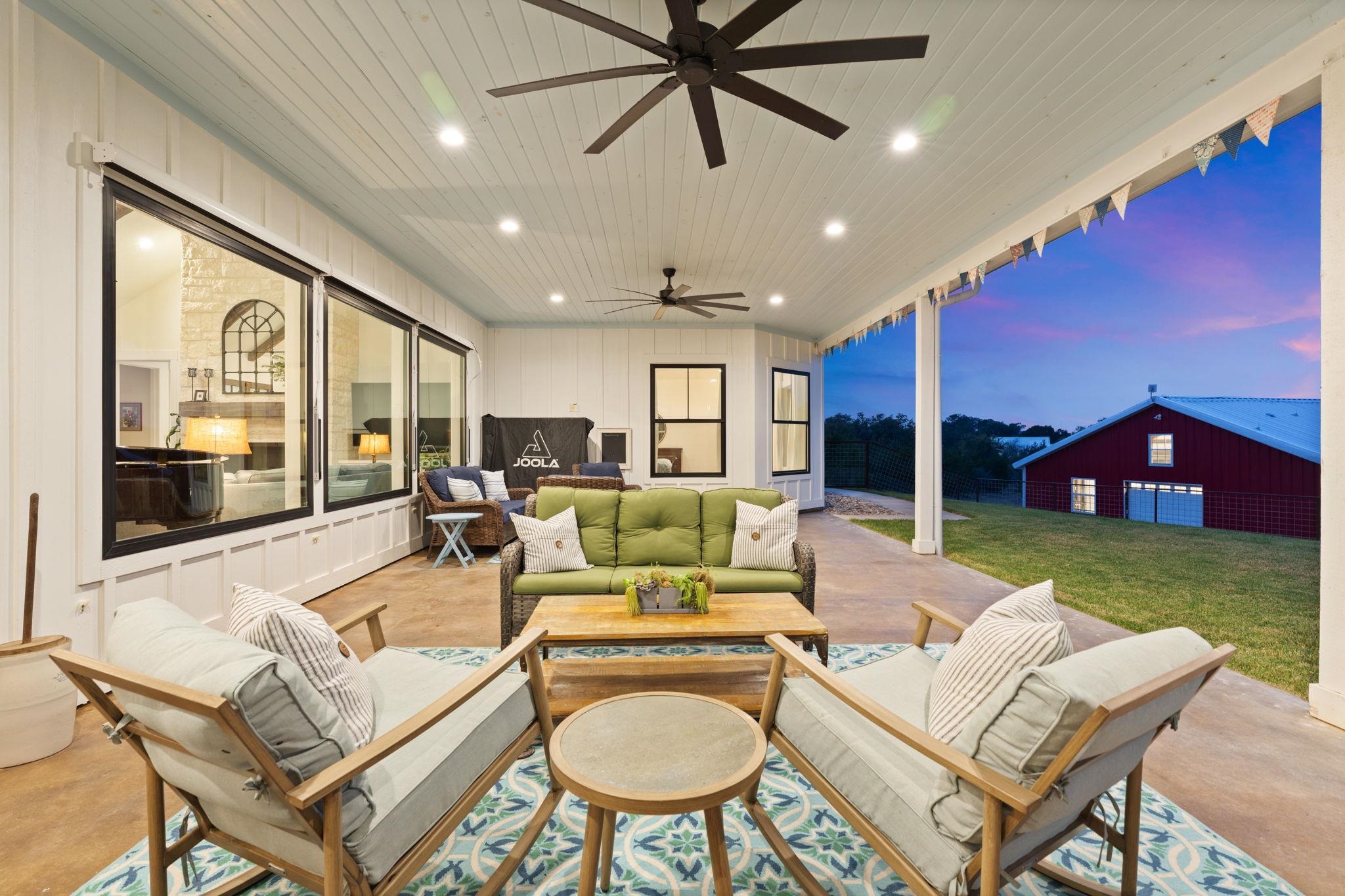 452 Southwick Ranch Road Johnson City, TX 78636 - Photo 28 of 44 a living room with furniture a garden and a yard
