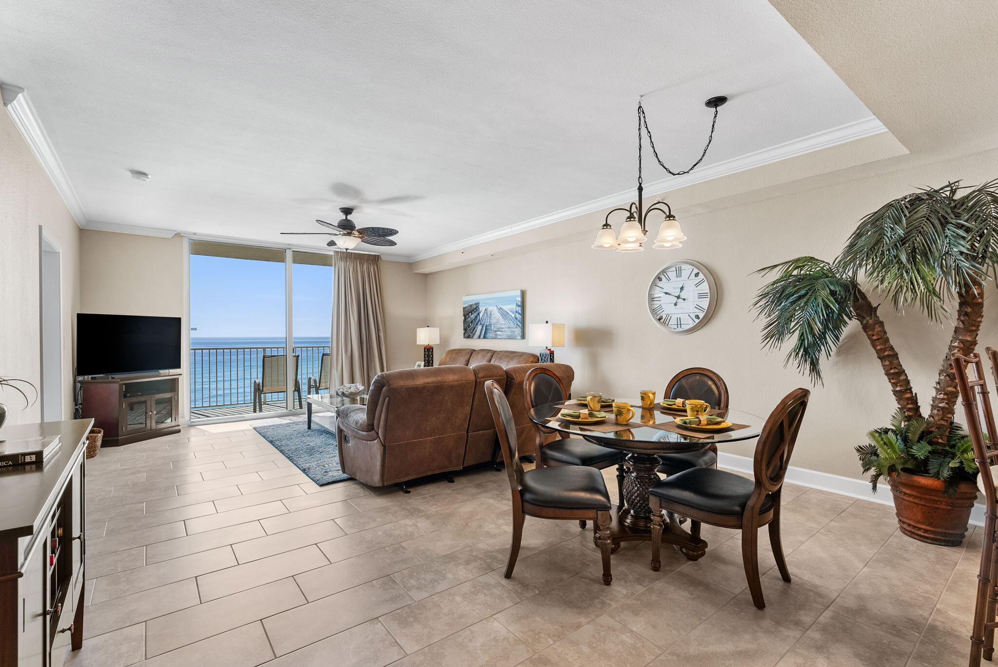 16819 Front Beach Road, Unit 405 Panama City Beach, FL 32413 - Photo 11 of 48 a view of a livingroom with furniture and a kitchen