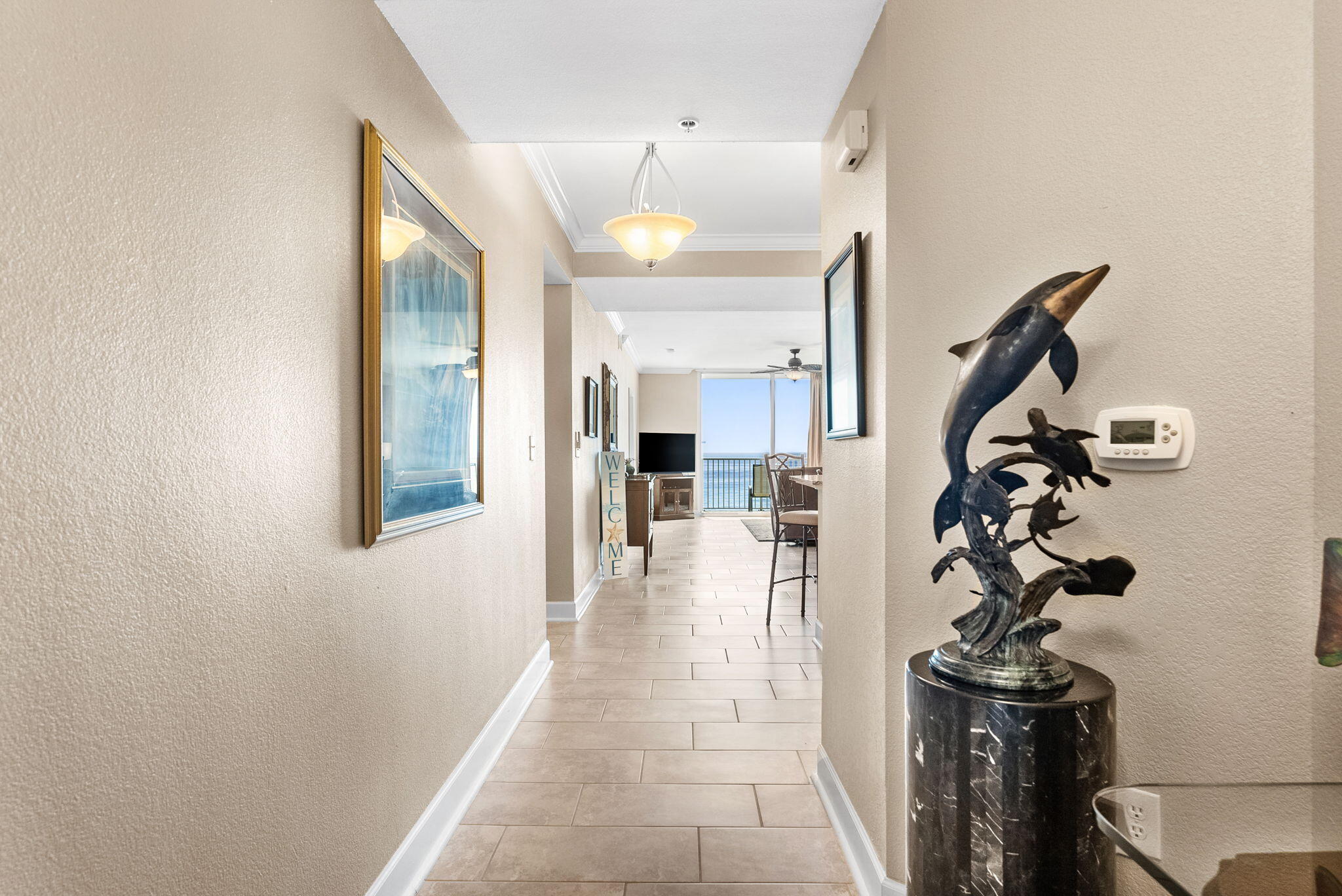 16819 Front Beach Road, Unit 405 Panama City Beach, FL 32413 - Photo 2 of 48 a view of a hallway view with staircase