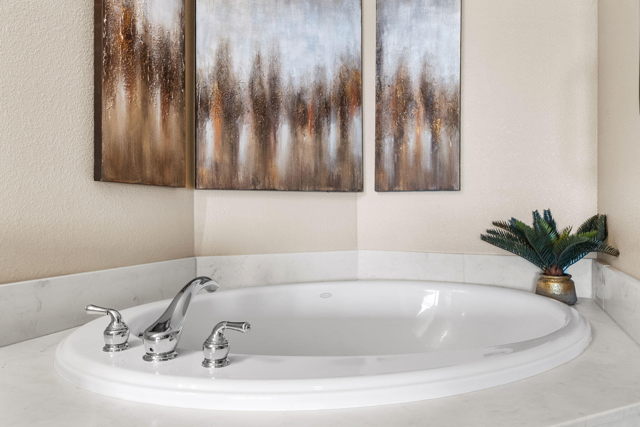 16819 Front Beach Road, Unit 405 Panama City Beach, FL 32413 - Photo 21 of 48 a bathroom with a bathtub