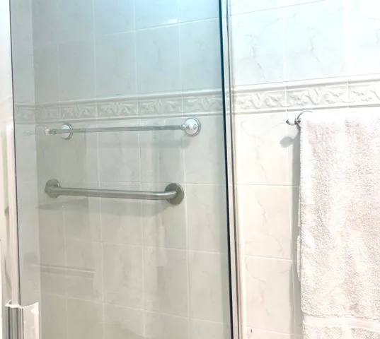 a view of a ocean with a palm tree