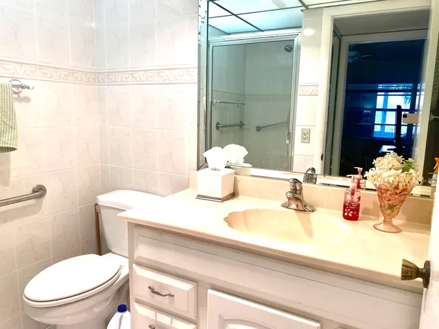 a view of a lake with a yard