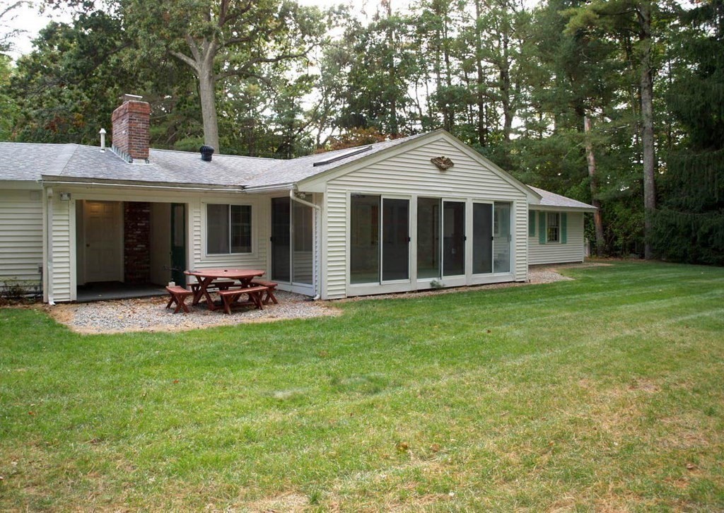 15 Clarissa Road Chelmsford, MA 01824 - Photo 21 of 22 a front view of a house with patio
