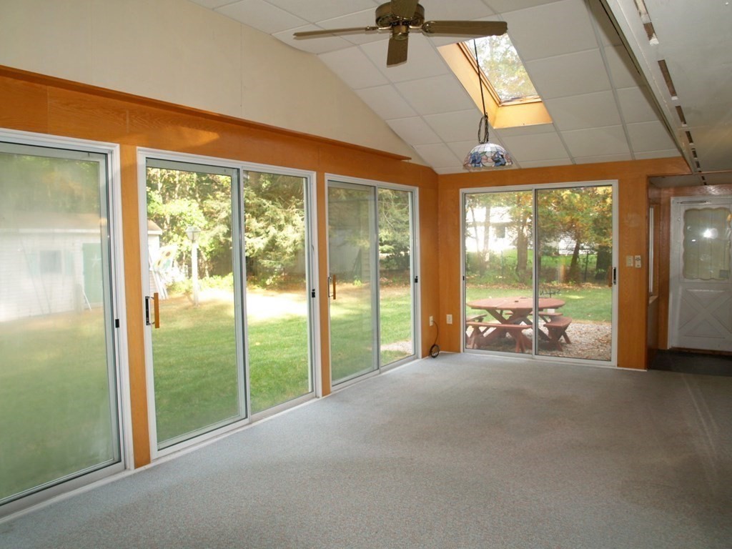 15 Clarissa Road Chelmsford, MA 01824 - Photo 9 of 22 a view of a room with sliding glass door and mountain view
