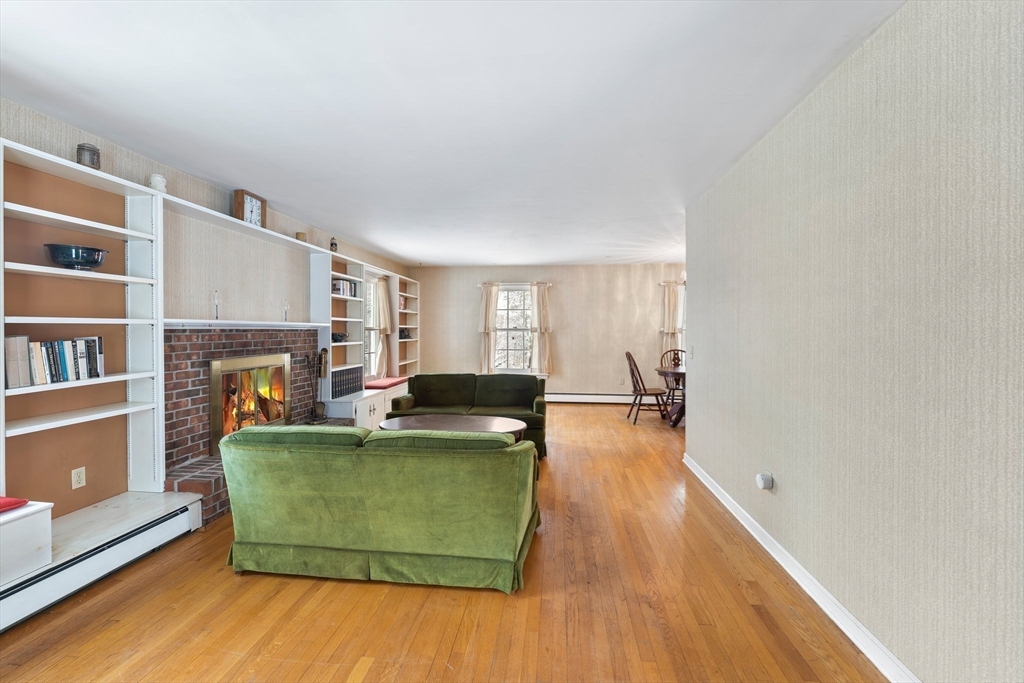 15 Country Hill Road Sturbridge, MA 01566 - Photo 11 of 41 a living room with furniture and a wooden floor
