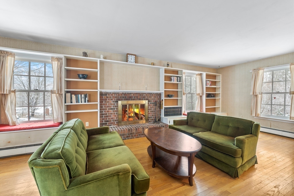 15 Country Hill Road Sturbridge, MA 01566 - Photo 13 of 41 a living room with furniture and a fireplace