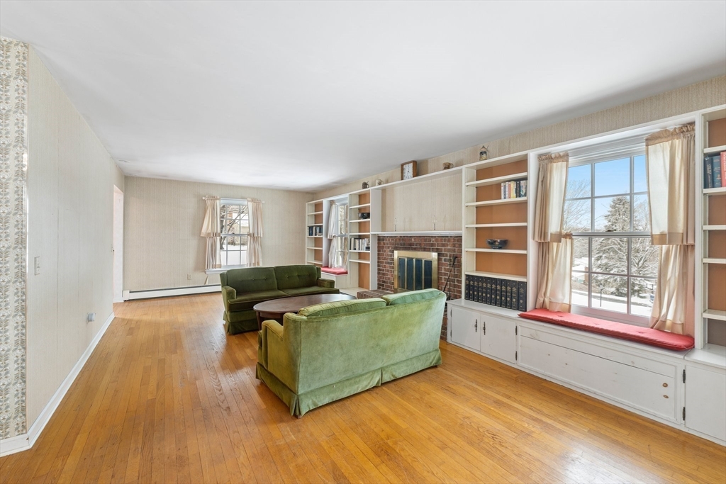 15 Country Hill Road Sturbridge, MA 01566 - Photo 14 of 41 a living room with furniture and a large window