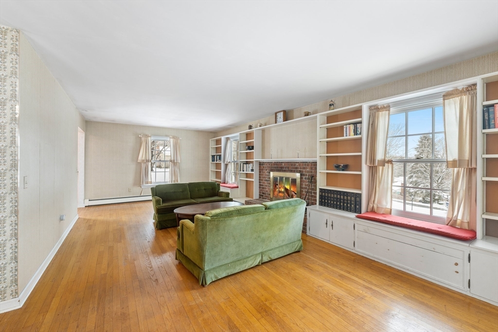 15 Country Hill Road Sturbridge, MA 01566 - Photo 15 of 41 a living room with furniture and a fireplace