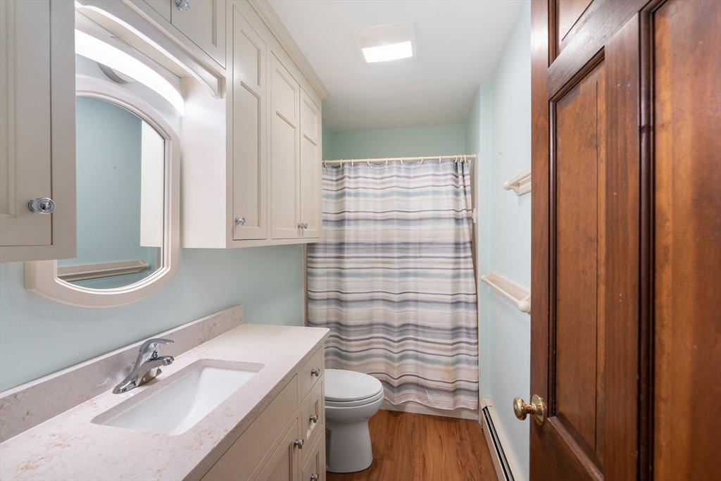 15 Country Hill Road Sturbridge, MA 01566 - Photo 16 of 41 a bathroom with a sink a toilet and shower