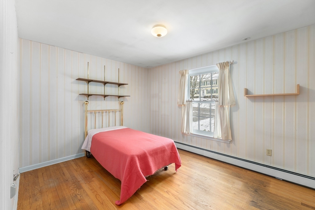 15 Country Hill Road Sturbridge, MA 01566 - Photo 17 of 41 a bedroom with a bed and a window