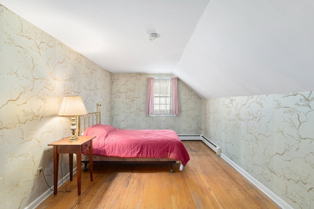 15 Country Hill Road Sturbridge, MA 01566 - Photo 24 of 41 a bedroom with a bed and a window