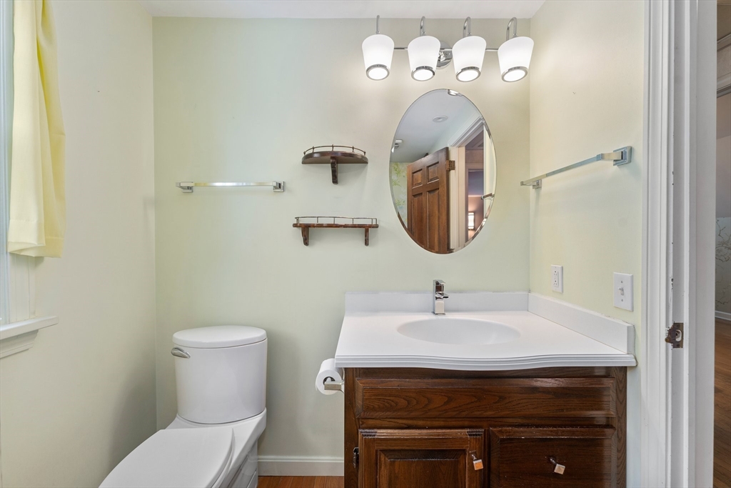 15 Country Hill Road Sturbridge, MA 01566 - Photo 26 of 41 a bathroom with a toilet sink and mirror