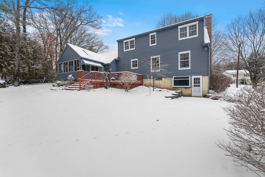15 Country Hill Road Sturbridge, MA 01566 - Photo 37 of 41 a view of a house with a yard covered in snow