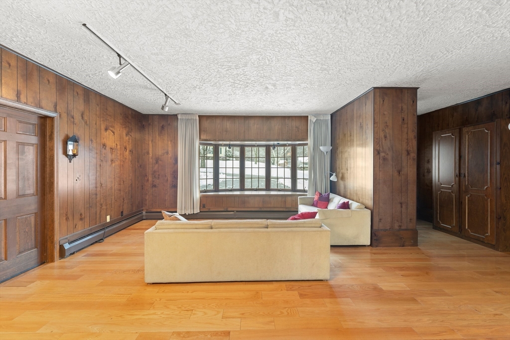 15 Country Hill Road Sturbridge, MA 01566 - Photo 5 of 41 a living room with a couch