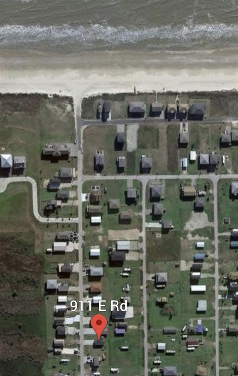 911 E Road Crystal Beach, TX 77650 - Photo 16 of 18 a close up of a wine shelf