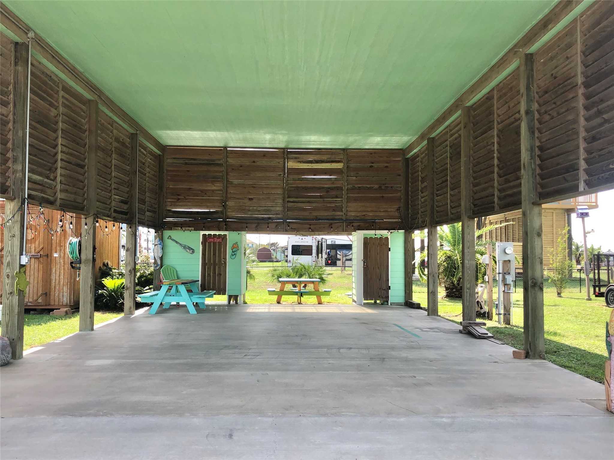 911 E Road Crystal Beach, TX 77650 - Photo 4 of 18 a view of a porch