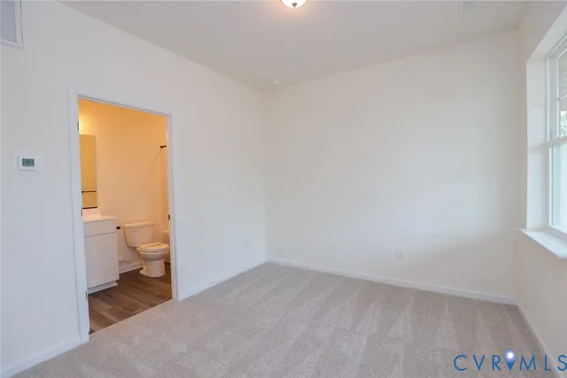 a bathroom with a toilet