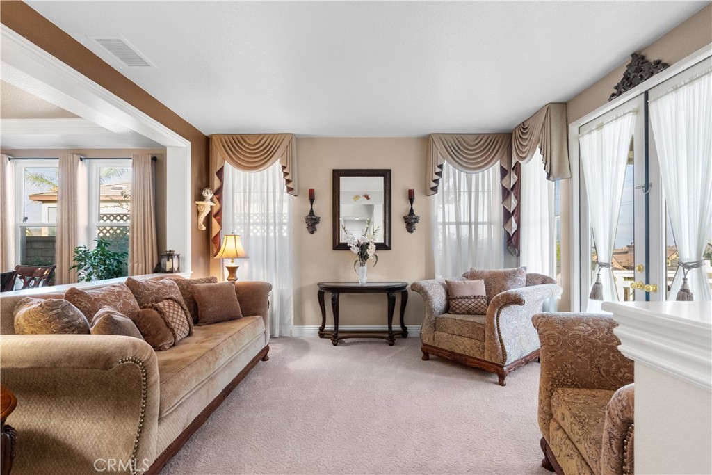 28834 Rock Canyon Drive Saugus, CA 91390 - Photo 11 of 58 a living room with furniture and a large window