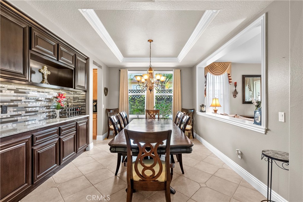 28834 Rock Canyon Drive Saugus, CA 91390 - Photo 12 of 58 a view of a dining room with furniture window and outside view