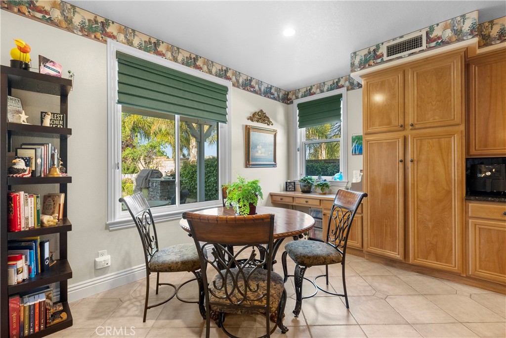 28834 Rock Canyon Drive Saugus, CA 91390 - Photo 19 of 58 a dining room with furniture and a window