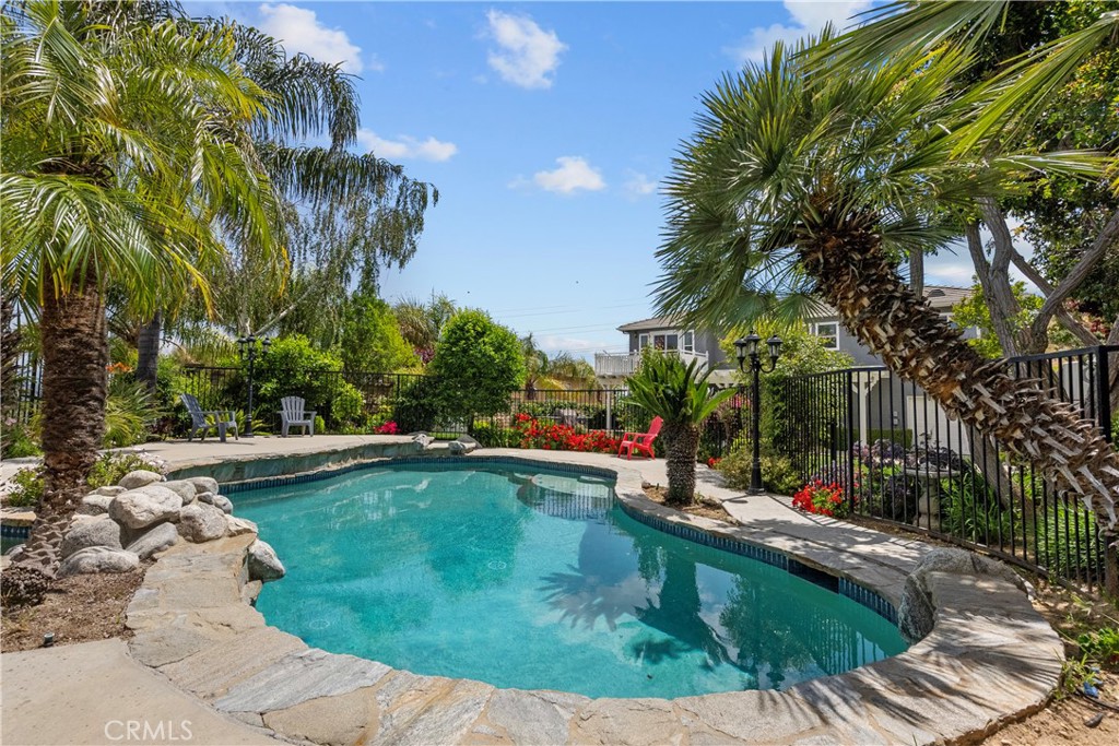28834 Rock Canyon Drive Saugus, CA 91390 - Photo 27 of 58 a view of a swimming pool with a sitting space