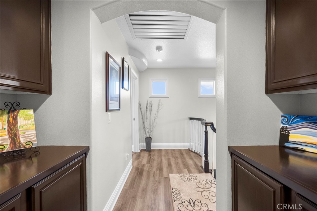 28834 Rock Canyon Drive Saugus, CA 91390 - Photo 29 of 58 a view of hallway with wooden floor
