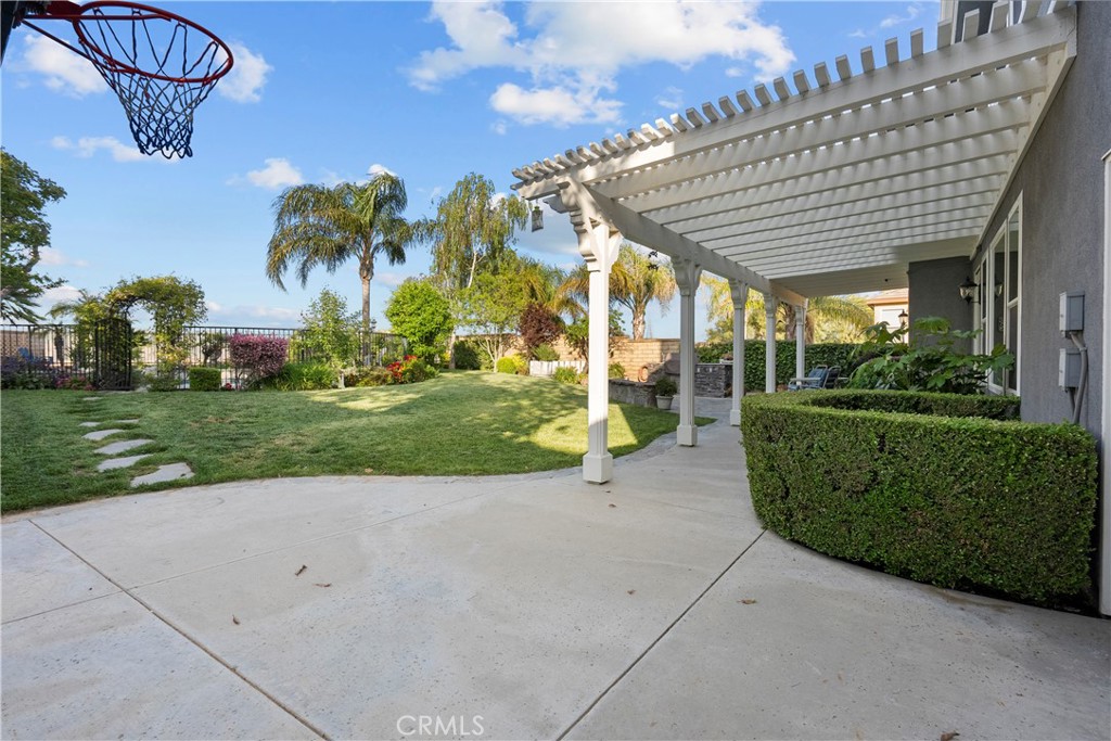 28834 Rock Canyon Drive Saugus, CA 91390 - Photo 47 of 58 a view of a porch with a table and chairs