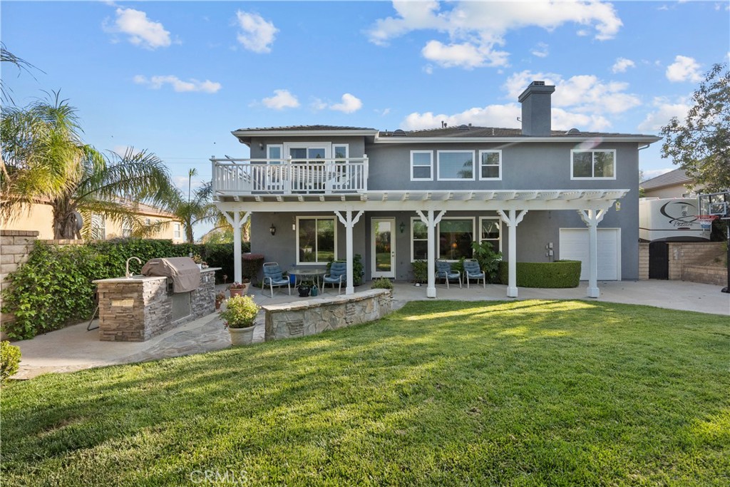 28834 Rock Canyon Drive Saugus, CA 91390 - Photo 49 of 58 a view of a house with a yard and sitting area