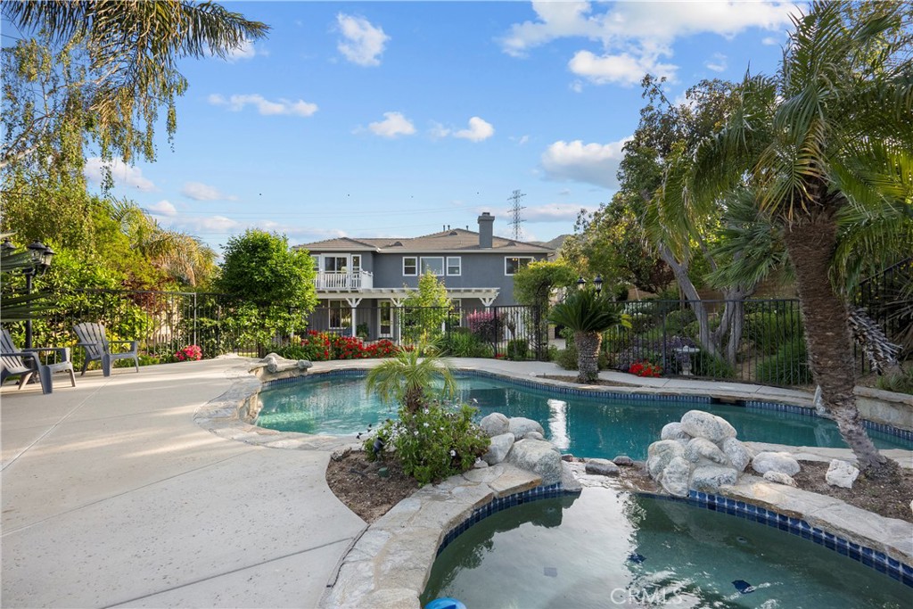 28834 Rock Canyon Drive Saugus, CA 91390 - Photo 50 of 58 a view of a lake with a house