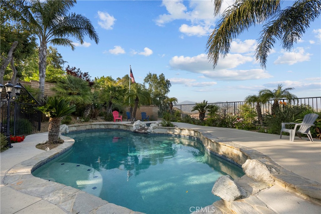 28834 Rock Canyon Drive Saugus, CA 91390 - Photo 53 of 58 a view of a swimming pool with a patio