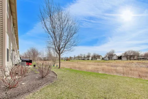 a view of a lake with a yard