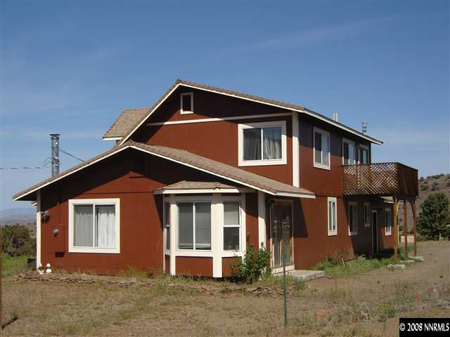 5700 Microwave Road Reno, NV 89510 - Photo 2 of 9 a front view of a house