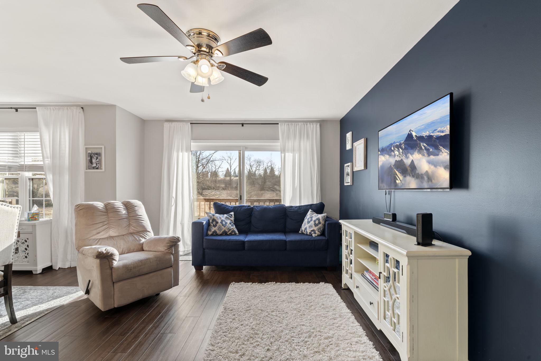 19 Chateau Circle, Unit 29 Chesterbrook, PA 19087 - Photo 11 of 40 a living room with furniture and a window
