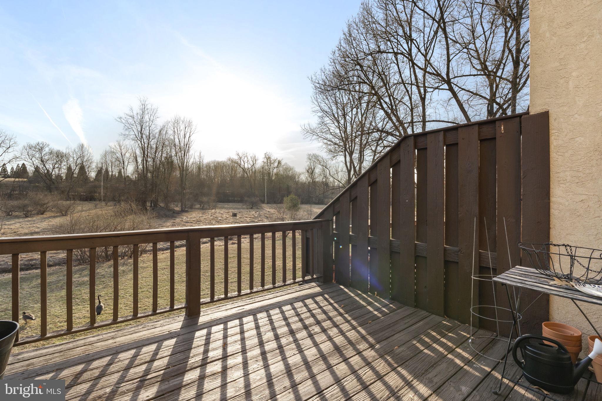 19 Chateau Circle, Unit 29 Chesterbrook, PA 19087 - Photo 13 of 40 a view of a balcony with wooden fence and floor