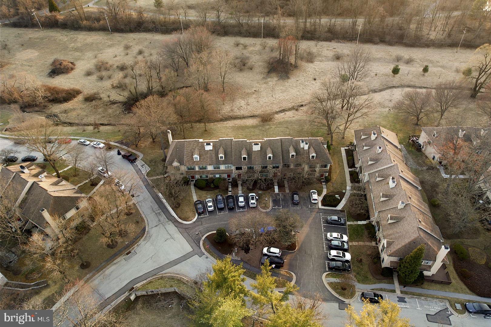 19 Chateau Circle, Unit 29 Chesterbrook, PA 19087 - Photo 2 of 40 an aerial view of a residential apartment building with a yard