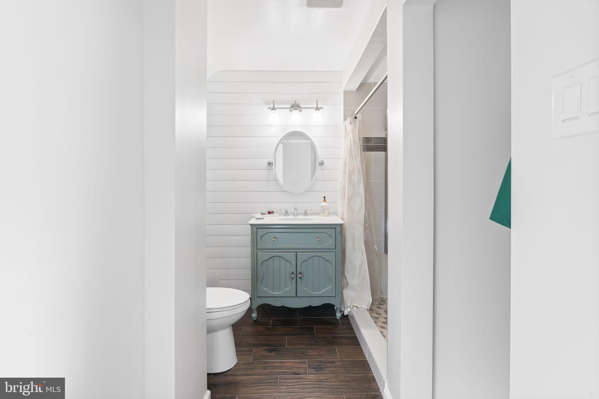 19 Chateau Circle, Unit 29 Chesterbrook, PA 19087 - Photo 23 of 40 a bathroom with a sink toilet and a mirror