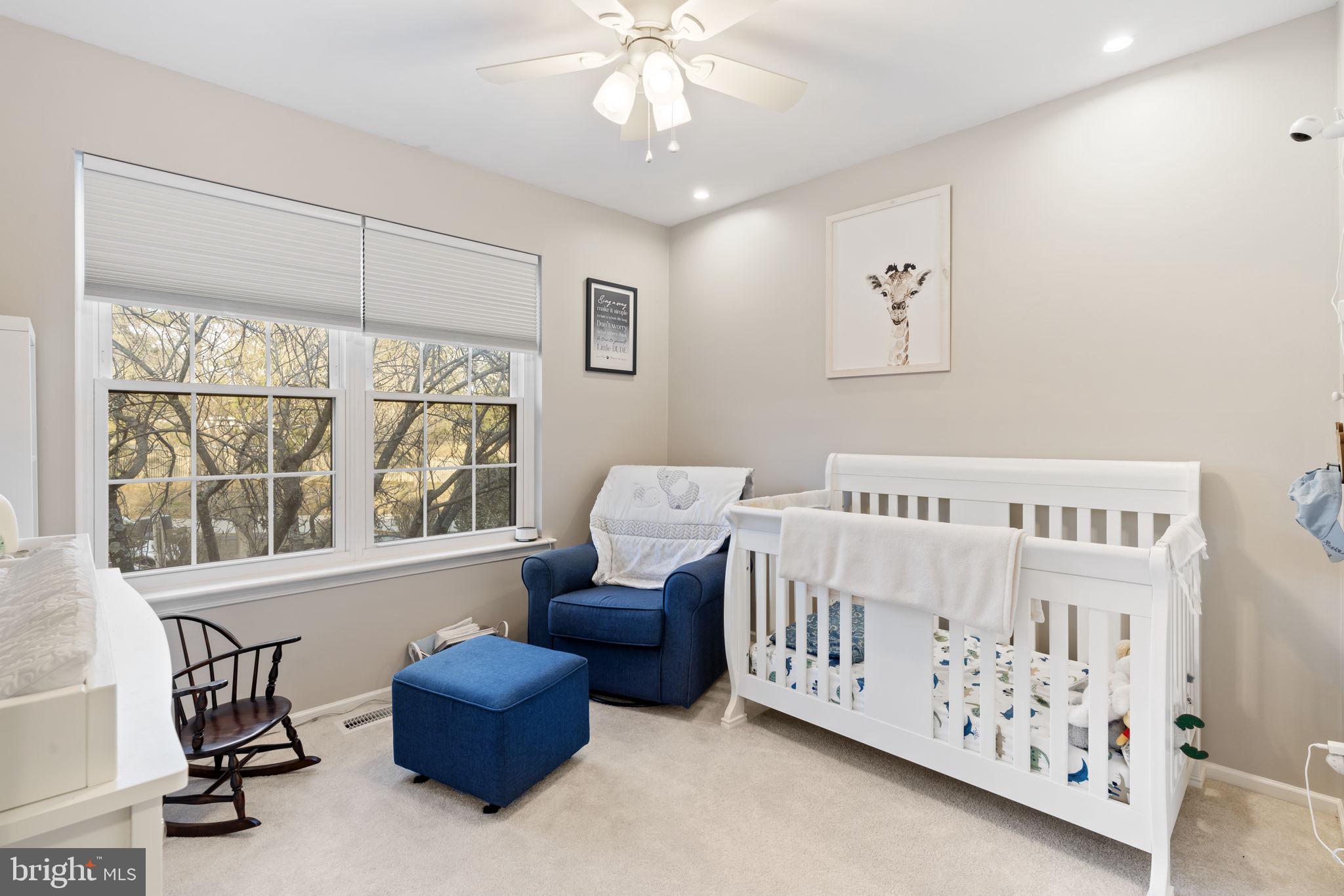 19 Chateau Circle, Unit 29 Chesterbrook, PA 19087 - Photo 28 of 40 a bedroom with furniture and a window
