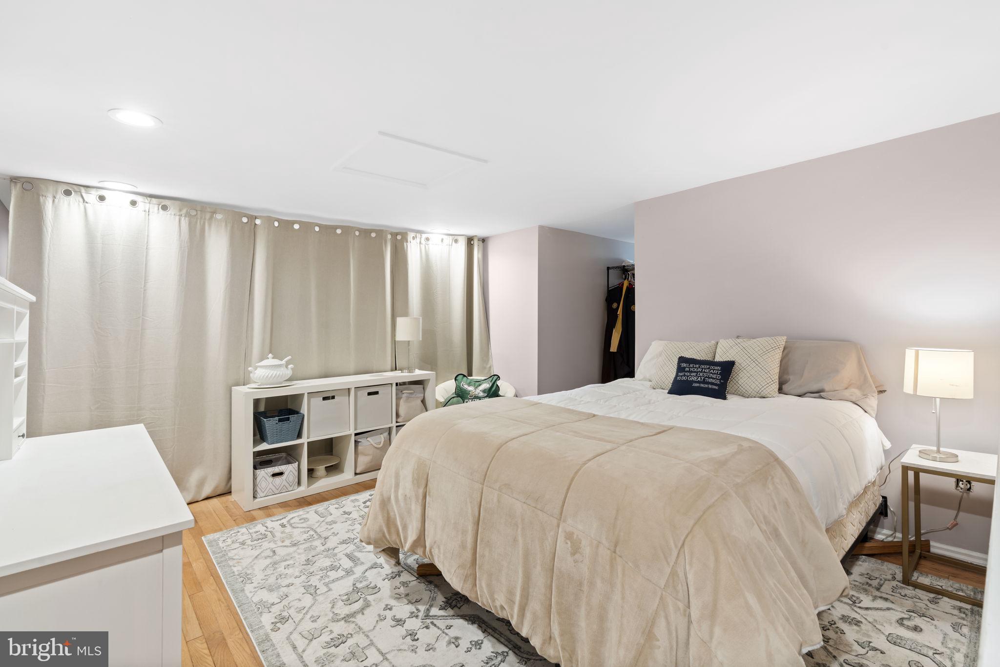 19 Chateau Circle, Unit 29 Chesterbrook, PA 19087 - Photo 31 of 40 a bed room with a bed and a chair