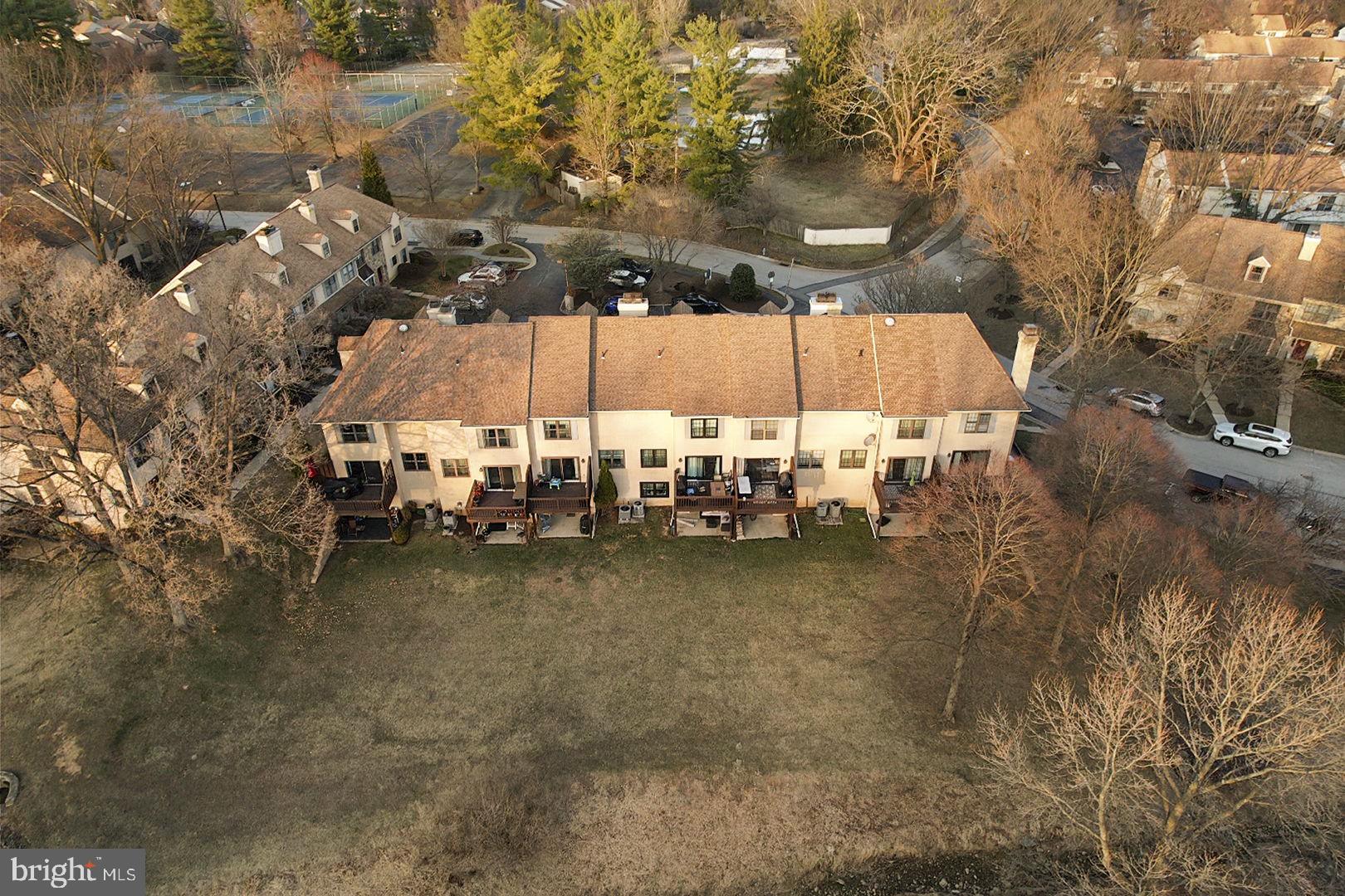 19 Chateau Circle, Unit 29 Chesterbrook, PA 19087 - Photo 35 of 40 aerial view of a house with a yard and sitting area