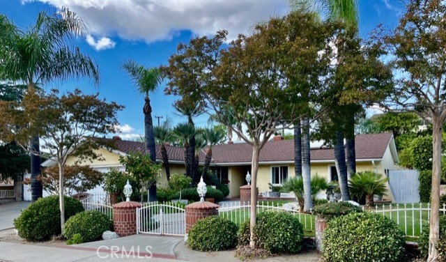 23519 Daisetta Drive Newhall, CA 91321 - Photo 1 of 1 front view of a house with a garden