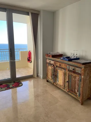 a room with a table and a chair