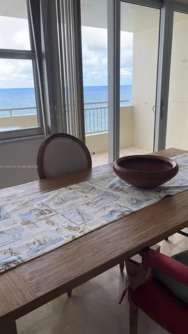a view of a kitchen with a sink