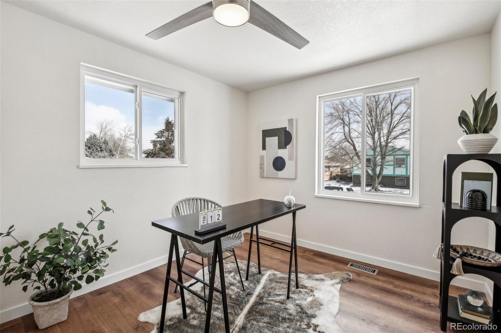 5153 Tucson Way Denver, CO 80239 - Photo 15 of 29 a workspace with furniture and a window