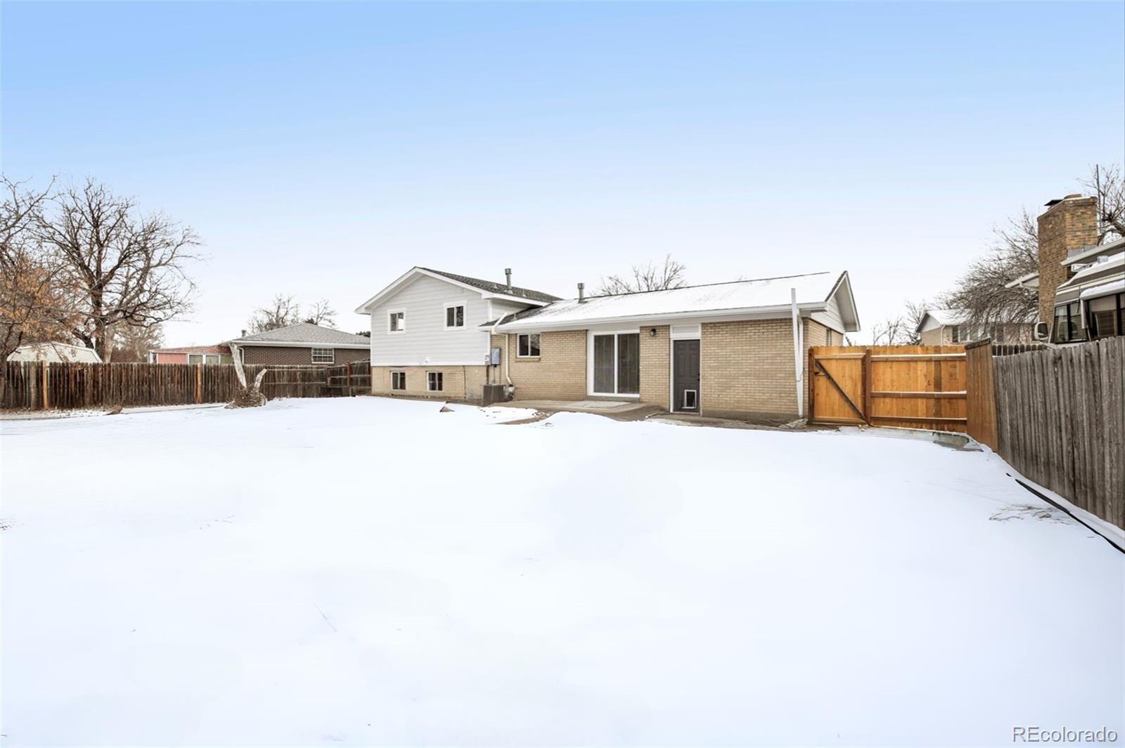 5153 Tucson Way Denver, CO 80239 - Photo 25 of 29 a house with a outdoor space