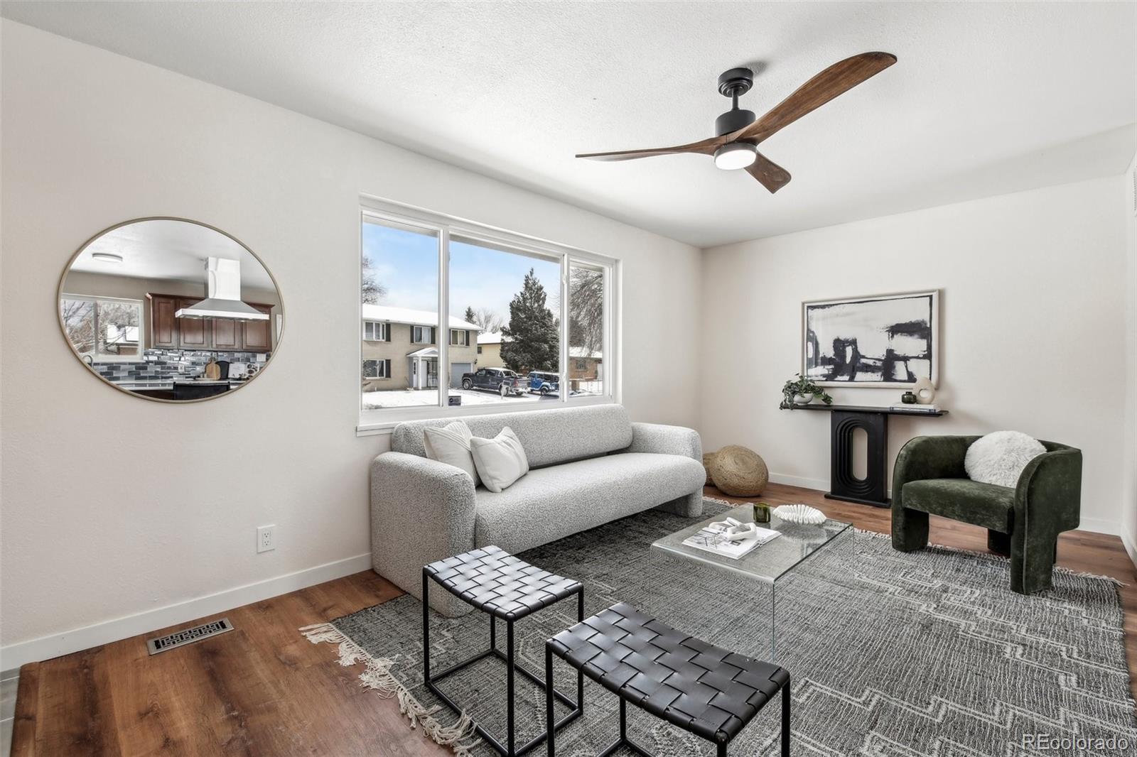 5153 Tucson Way Denver, CO 80239 - Photo 5 of 29 a living room with furniture
